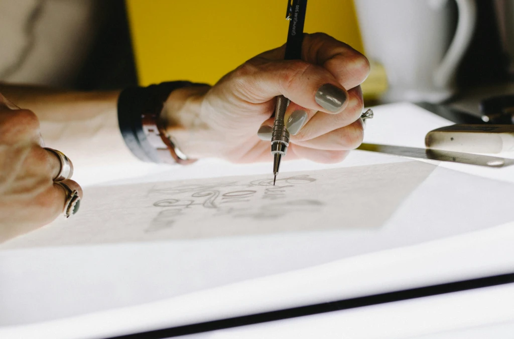 A person drawing.