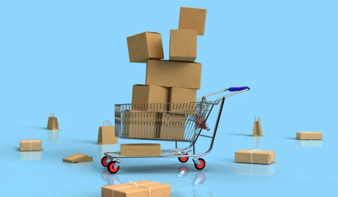 A trolley filled with cardboard boxes.