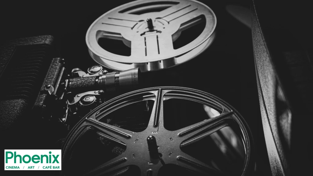 Cinema film reels in black and white.